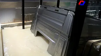 Truck Cab Moving Between E-Coat Tanks