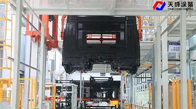 Automatic Truck Cab Transfer and Adhesive Drying